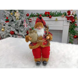 Figurina Decorativa Craciun, Flippy, Mos Craciun Asezat cu Surcele la Brat, 35 x 18 x 20 cm, Material Plastic+Textil, Interior/Exterior, Rosu/Maro