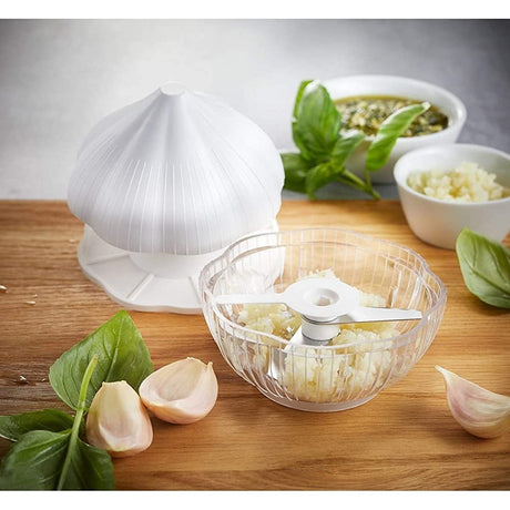 Tocator manual pentru usturoi, in forma de usturoi, cutite rezistente, utilizare prin apasare, material ABS si inox, 9.5x9.5x9.3 cm, alb - vivimall.ro